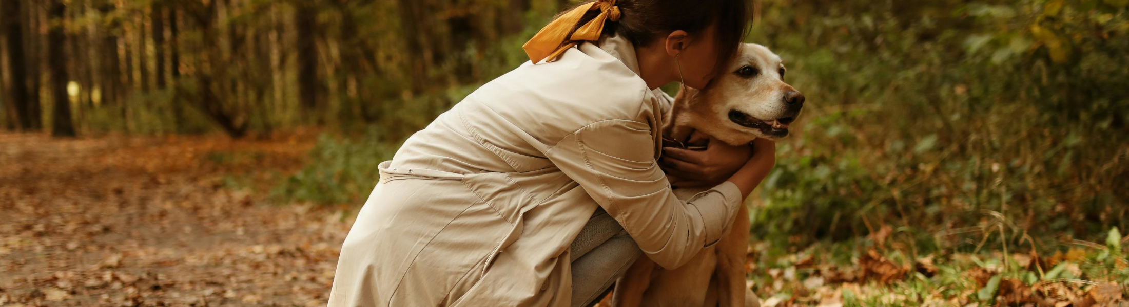 October is Depression Awareness month woman kissing dog