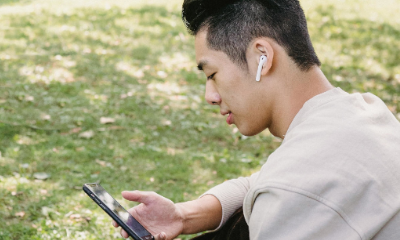 young adult taking a mental health screening on his phone